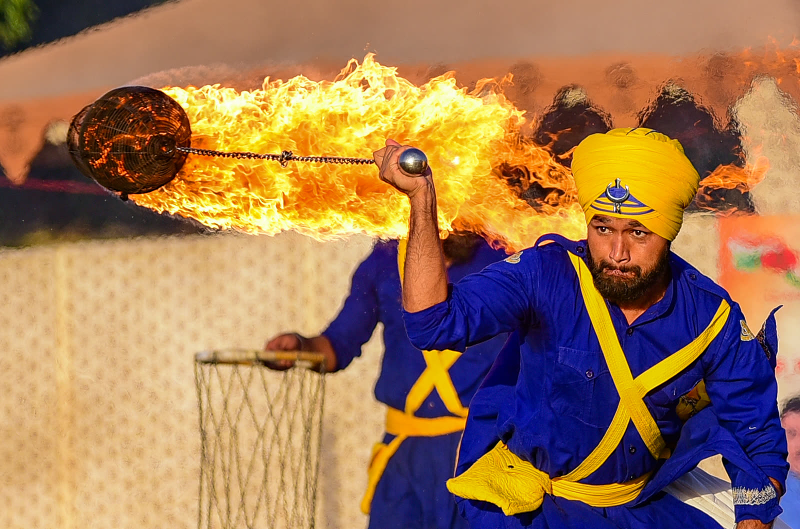 A performer swinging a ring of fire